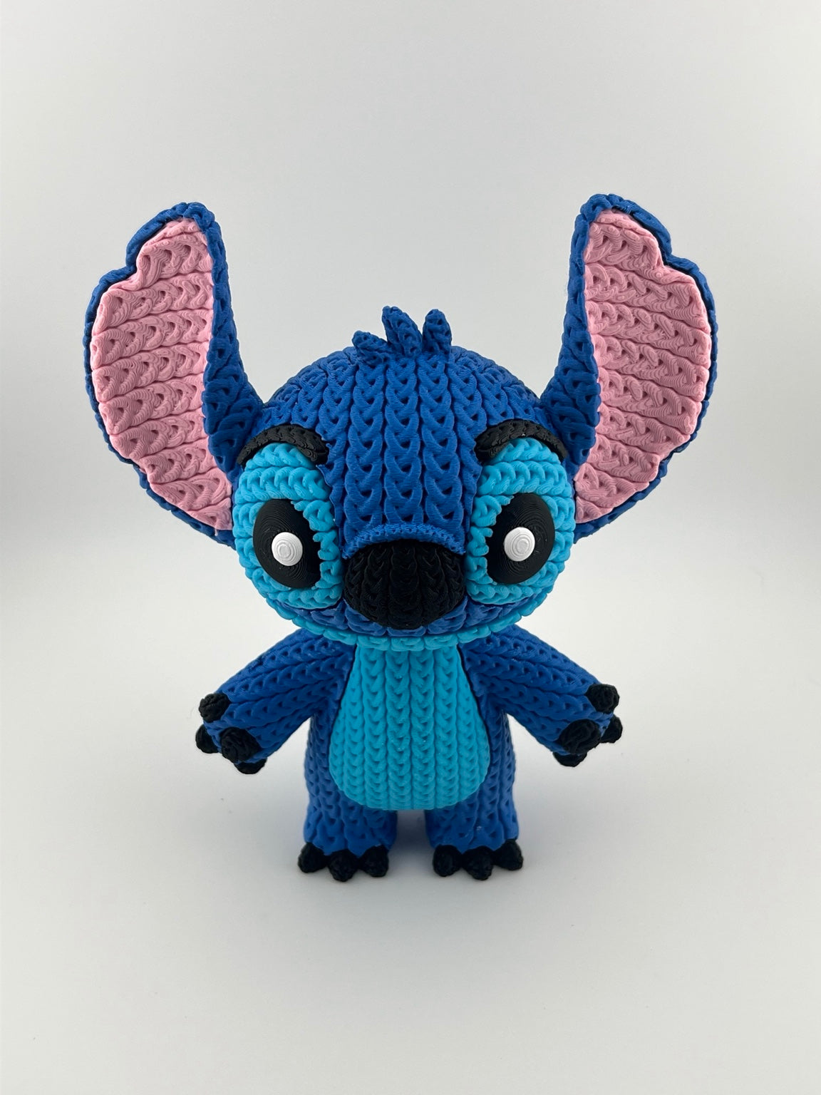 Crochet-style 3D printed Stitch figure, front view
