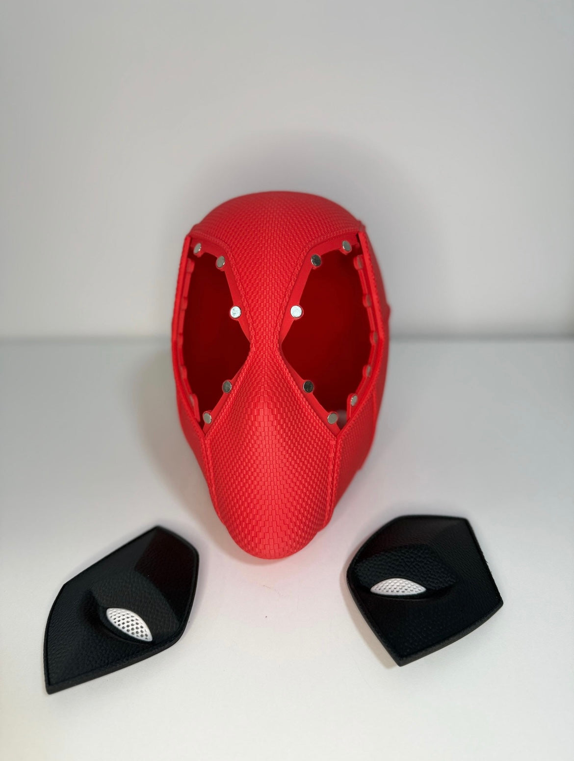 Deadpool helmet showing both removable magnetic eye panels