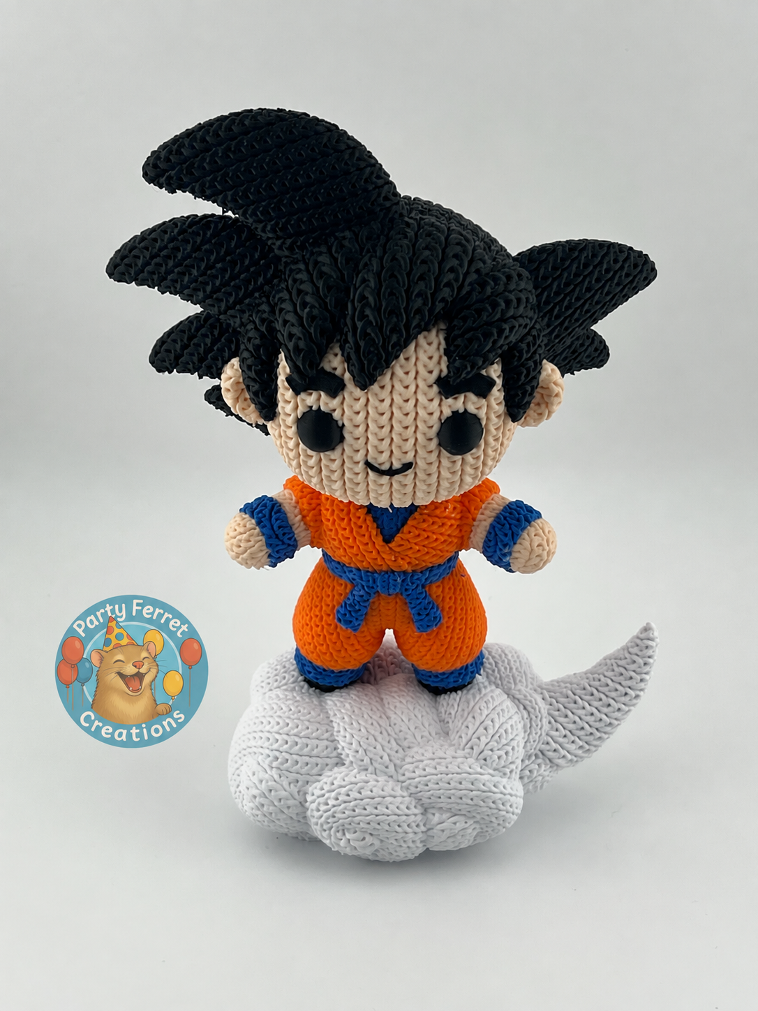 Crochet-style 3D-printed Goku on Nimbus with Party Ferret Creations watermark