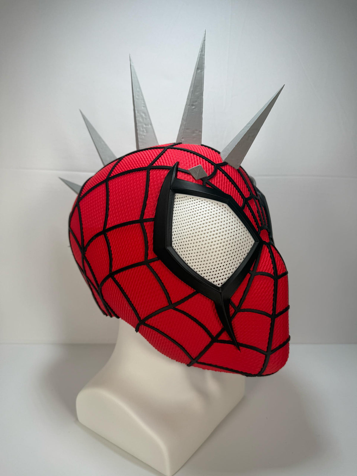 3D printed Spider-Punk helmet, opposite three-quarter view. Spikes shown assembled; shipped unattached.